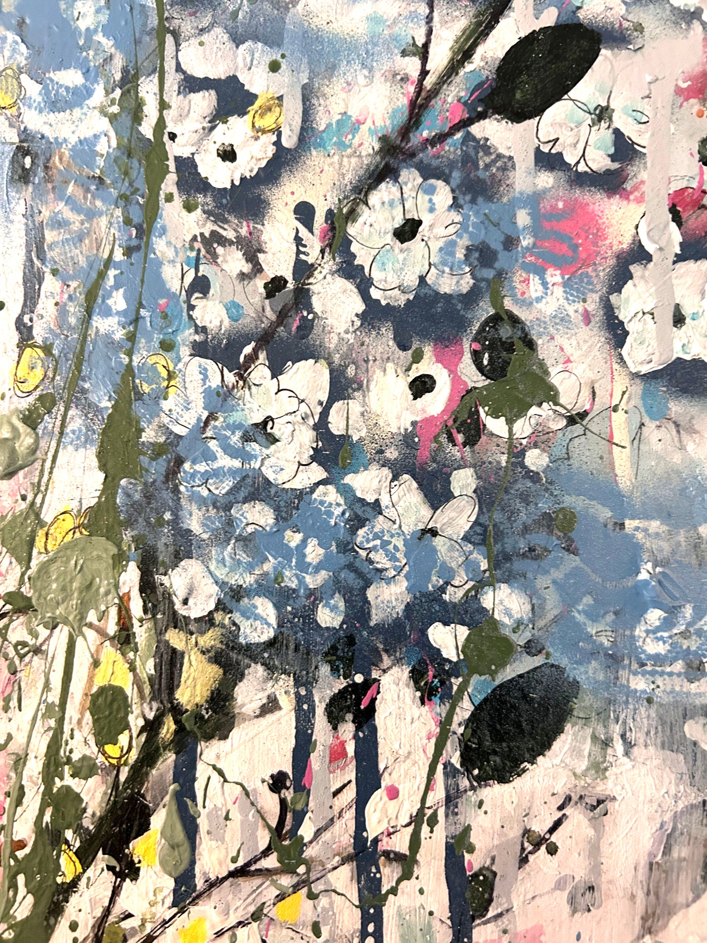 Hydrangeas in a blue vase and pink champagne