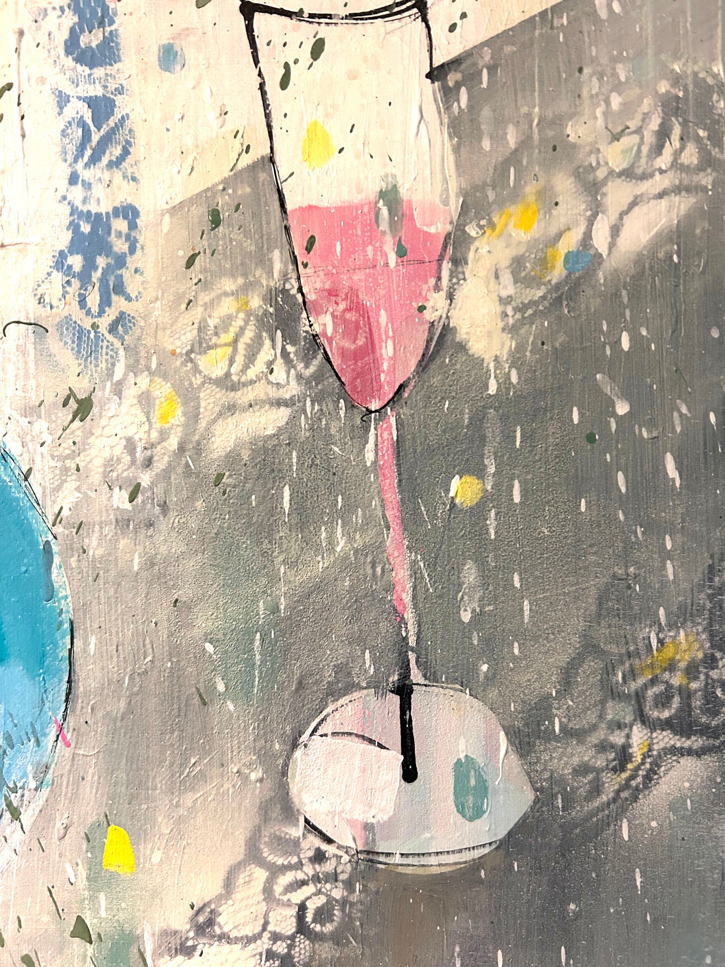 Hydrangeas in a blue vase and pink champagne