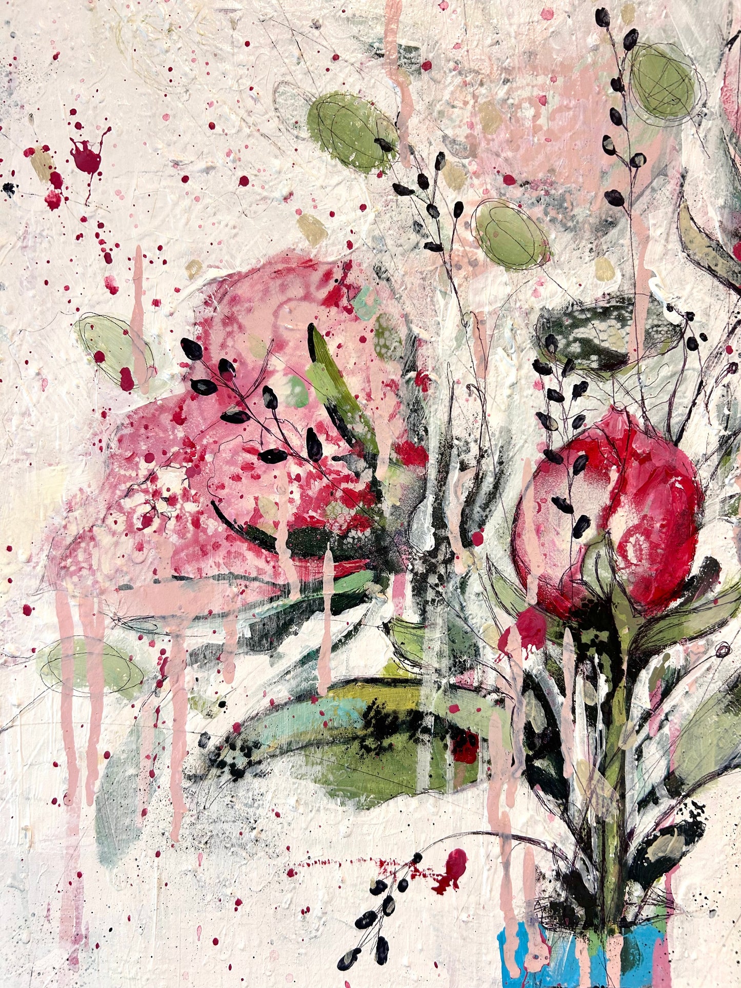 Peonies in round blue vase