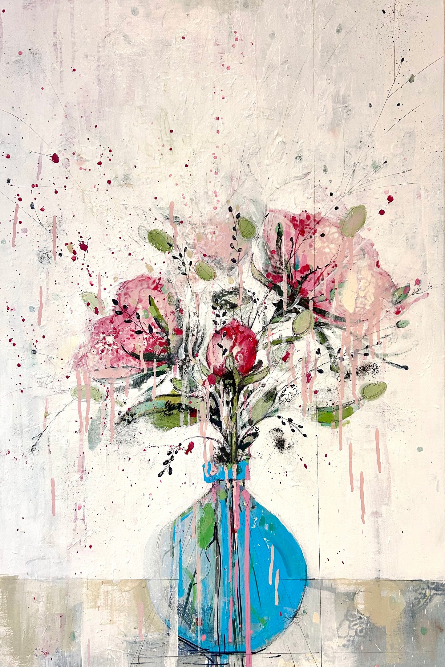 Peonies in round blue vase