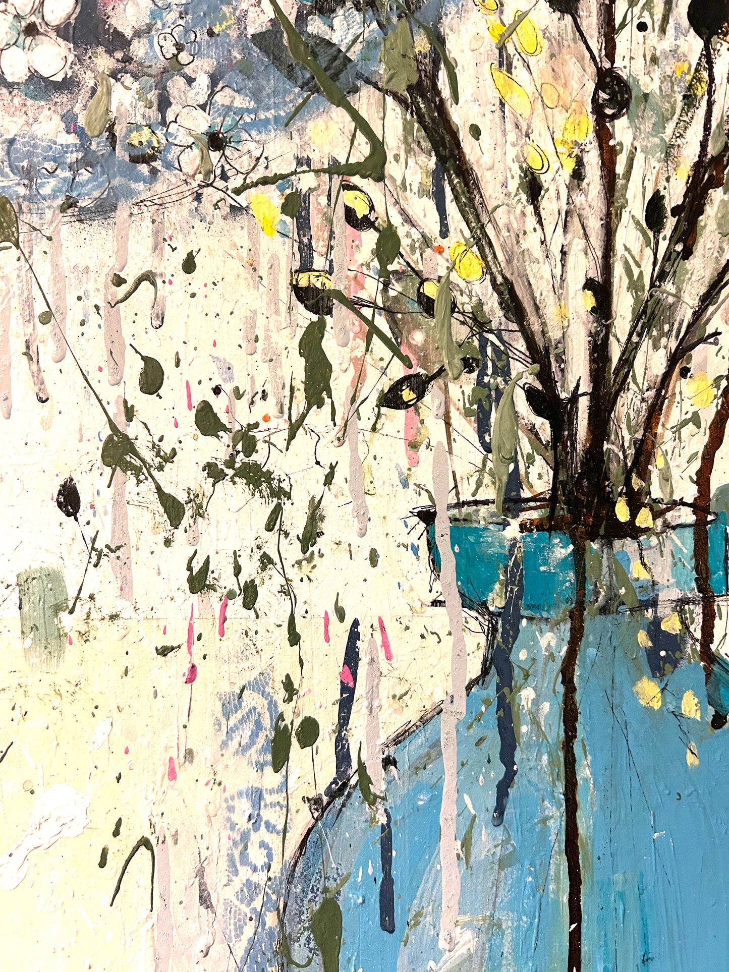 Hydrangeas in a blue vase and pink champagne