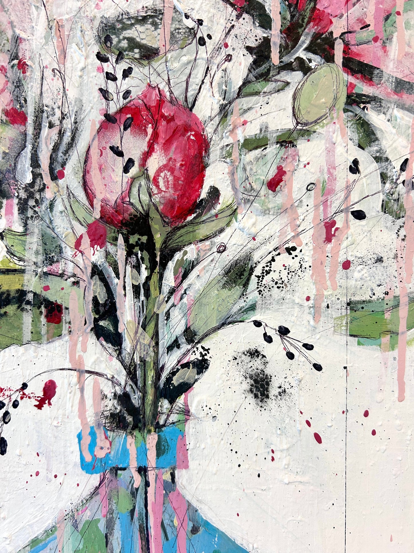 Peonies in round blue vase