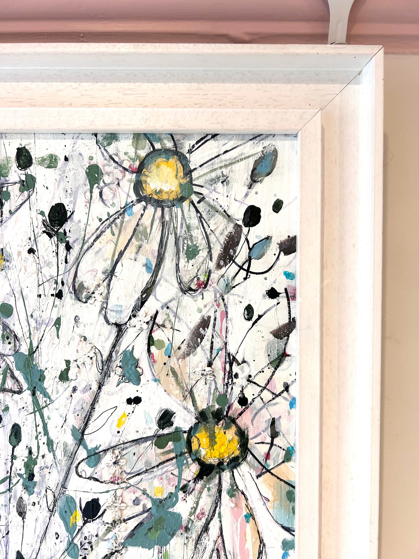 Daisies in blue stripped vase