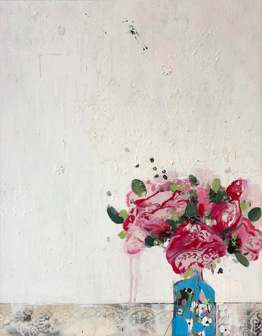 Peonies in a small blue vase