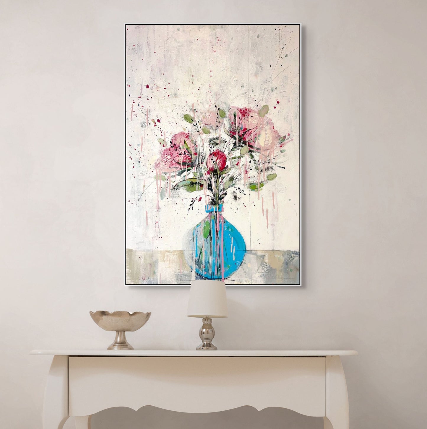 Peonies in round blue vase