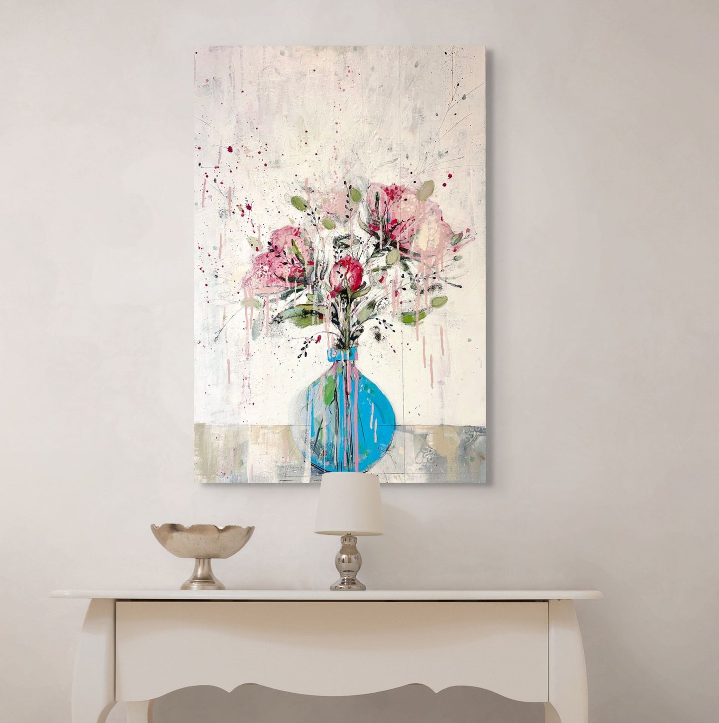 Peonies in round blue vase