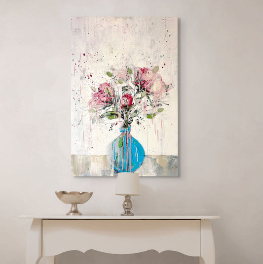 Peonies in round blue vase