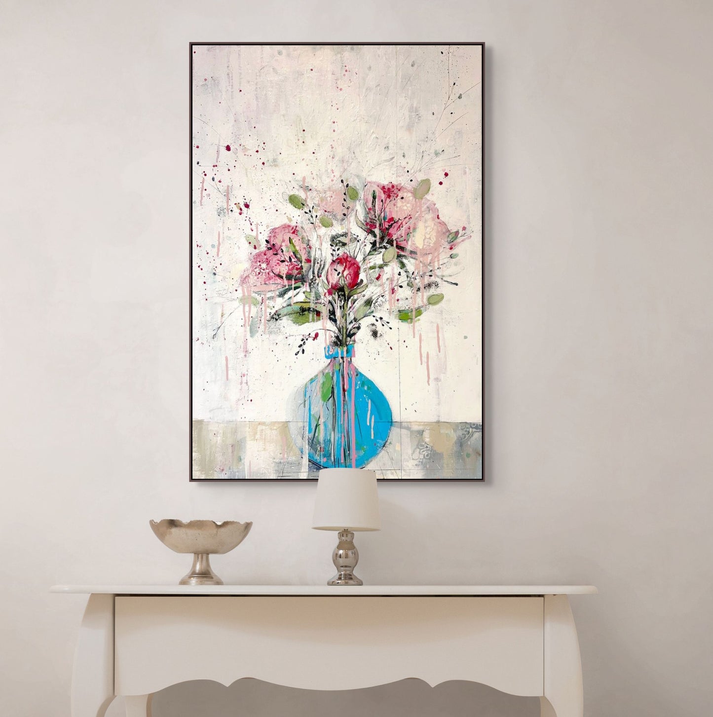 Peonies in round blue vase